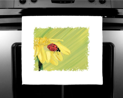 Nature's Own - Luxury handprinted tea towel,  Ladybird on yellow flower painting